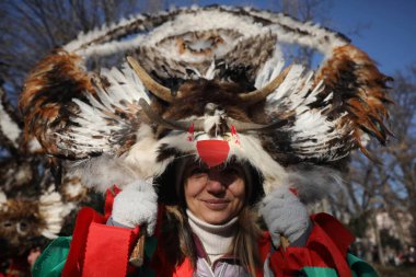 Sofia, Bulgaria - January 05, 2025: The Surva masquerade games festival in Sofia, Bulgaria. People called Kukeri parade in masks and ritual costumes, perform ritual dances to drive away evil spirits in Sofia, Bulgaria clipart