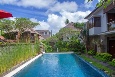 luxurious tropical swimming pool for summer vacation leisure