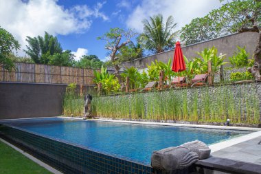 luxurious tropical swimming pool for summer vacation leisure