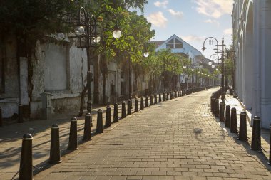 Kota Lama or Old City, Semarang downtown street with old historical building  clipart