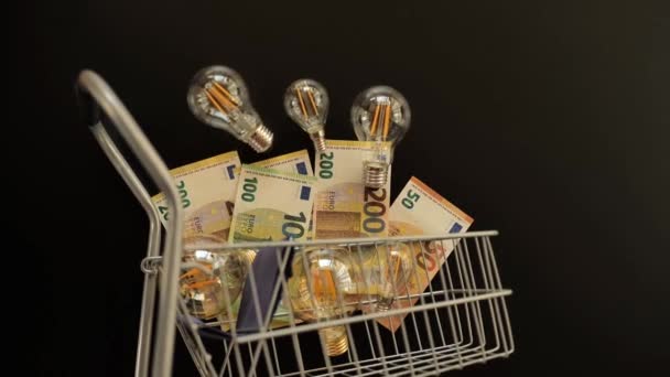 Preço Eletricidade Europa Lâmpadas Dinheiro Euro Carrinho Compras Imagens Alta — Vídeo de Stock