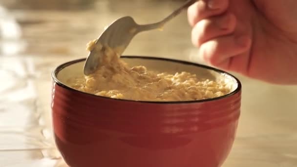 Oatmeal Useful Breakfast Man Stirring Hot Oatmeal Cup Hot Porridge — Stockvideo