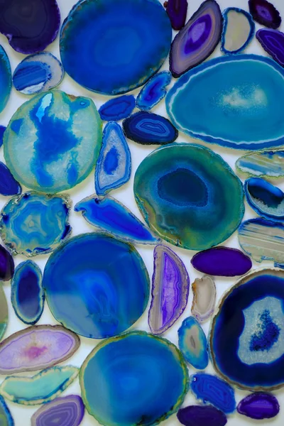 Agate background.Blue and green agate texture.Beautiful stone natural background in blue and green tones.