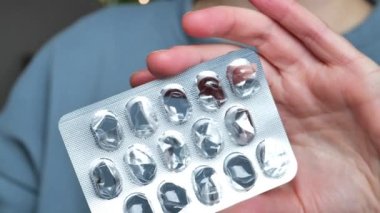 Lack of medicines. The medicine is over.The drug has run out.Empty pill box. Empty packaging of pills in a female hand Slow motion. The drug problem.Problematic treatment. 4k footage