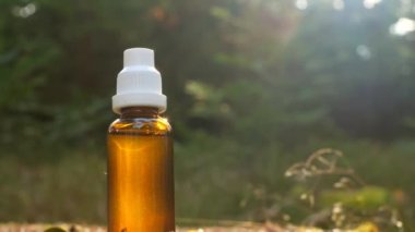 Herbal tincture.Treatment with herbal remedies.tincture in a glass brown bottle. 4k footage