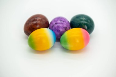 Easter multicolored eggs on a light background.Easter food.Easter holiday tradition.