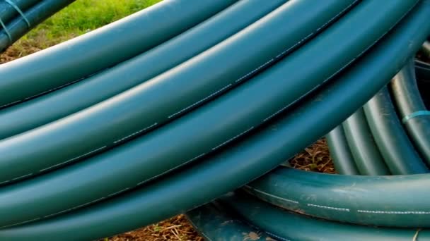 Green Water Pipes Close Set Plumbing Plastic Flexible Pipes Rolls — Stock Video