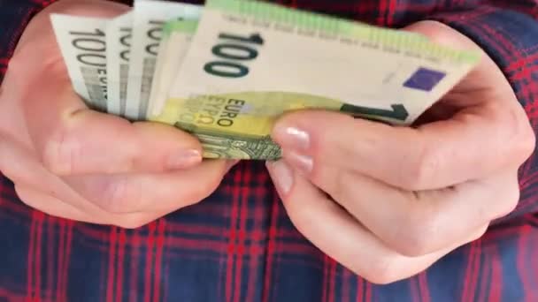 Counting Banknotes Woman Checkered Shirt Counts One Hundred Euro Banknotes — Stock Video