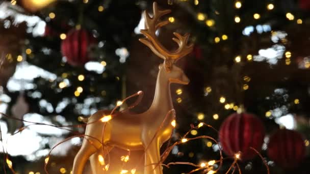 Karácsonyi Tapéta Arany Szarvas Arany Bokeh Koszorúk Felvétel — Stock videók