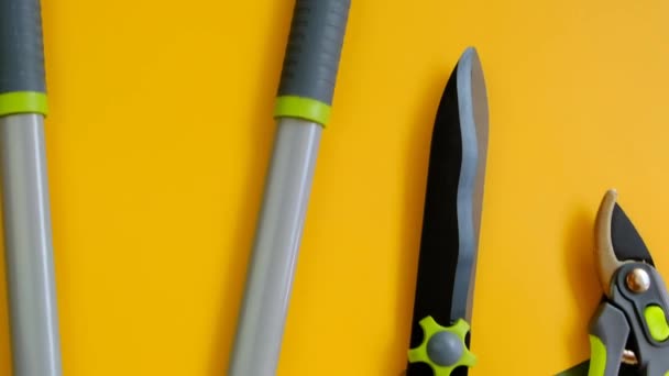 Garden Tool Set Yellow Green Background Secateurs Loppers Hedge Trimmers — Stock Video