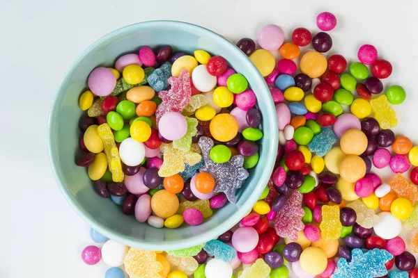 candies in the bowl, colorful candies background, large group of candies