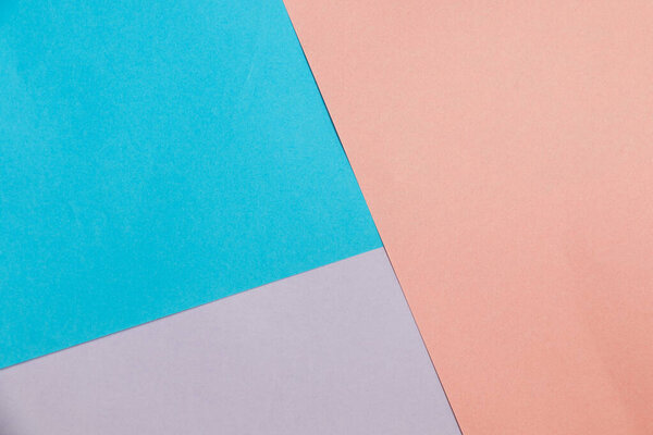 Цветной бумажный фон, бумажная доска и геометрические фигуры, пастельные цвета
