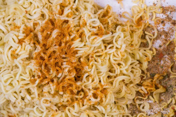 Fast food, raw and cocked chinese noodles with spices