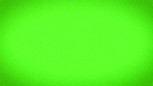 古い破損したフィルムノイズアニメーション 4Kループ クロマキーの緑の背景 — ストック動画