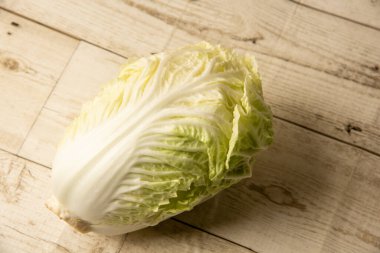 Lettuce on wooden background, healthy vegetable, food