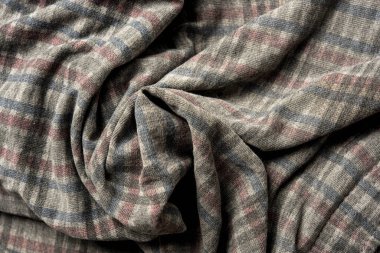Kumaşın dokusunda değişik renkler var. Güzel bir kumaş arkaplan resmi üzerinde