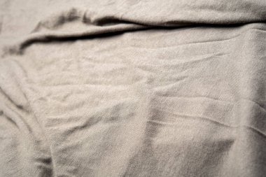 Kumaşın dokusunda değişik renkler var. Güzel bir kumaş arkaplan resmi üzerinde