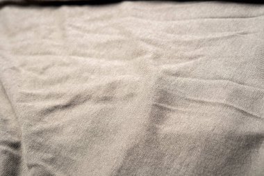 Kumaşın dokusunda değişik renkler var. Güzel bir kumaş arkaplan resmi üzerinde