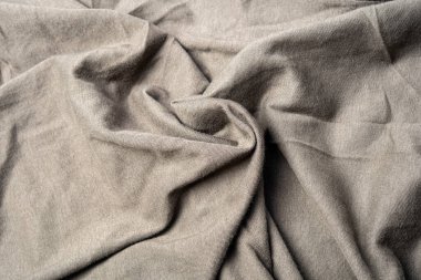 Kumaşın dokusunda değişik renkler var. Güzel bir kumaş arkaplan resmi üzerinde