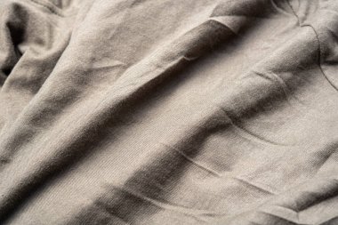 Kumaşın dokusunda değişik renkler var. Güzel bir kumaş arkaplan resmi üzerinde