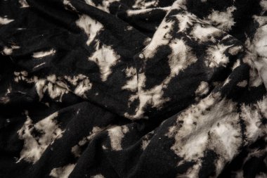 Kumaşın dokusunda değişik renkler var. Güzel bir kumaş arkaplan resmi üzerinde