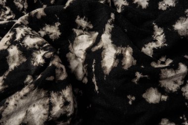 Kumaşın dokusunda değişik renkler var. Güzel bir kumaş arkaplan resmi üzerinde