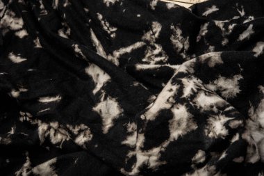 Kumaşın dokusunda değişik renkler var. Güzel bir kumaş arkaplan resmi üzerinde