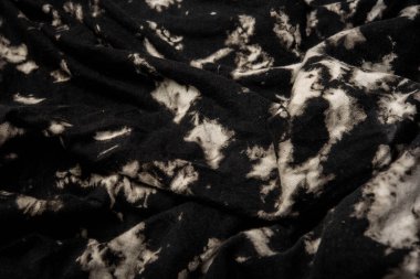 Kumaşın dokusunda değişik renkler var. Güzel bir kumaş arkaplan resmi üzerinde