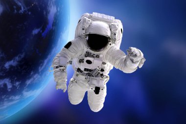Uzaydaki astronot ve evrendeki Dünya gezegeni. Kozmos keşif konsepti. Bu görüntünün elementleri NASA tarafından desteklenmektedir. 