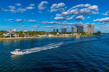 A view down the channel leading to the mouth of the Stranahan river from Port Everglades, Fort Lauderdale on a bright sunny day