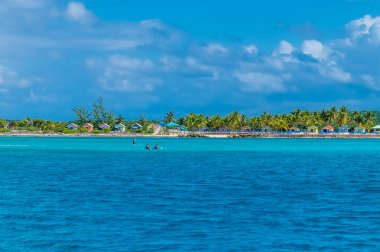 A view towards sandy beaches on the island of Eleuthera, Bahamas on a bright sunny day