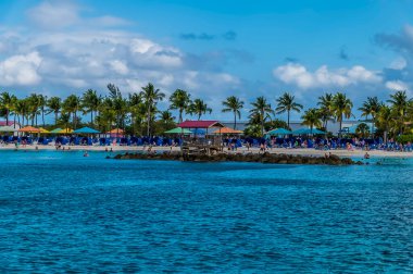 A view towards a beach resort on the island of Eleuthera, Bahamas on a bright sunny day
