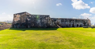 A view between battlements in of the Castle of San Cristobal, San Juan, Puerto Rico on a bright sunny day