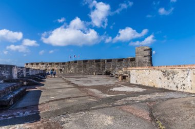 A view south between the upper and lower battlements in of the Castle of San Cristobal, San Juan, Puerto Rico on a bright sunny day