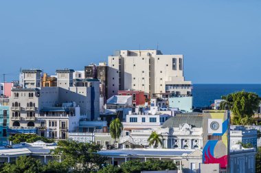 A view from the port towards residential buildings in San Juan, Puerto Rico on a bright sunny day