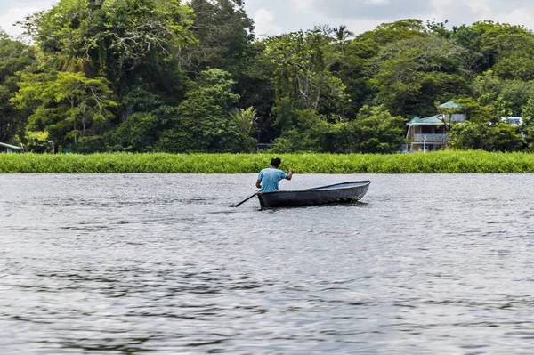 stock image A view of light river traffic on the Tortuguero River close to the sea in Costa Rica during the dry season