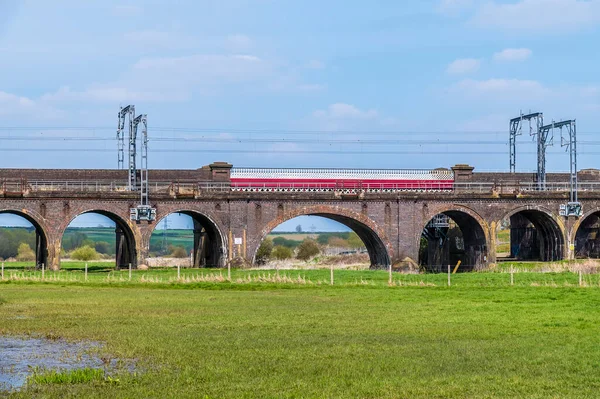 stock image A view of the Irchester viaduct spanning the River Nene near Wellingborough UK in the early summer