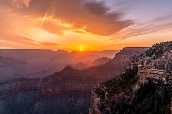 Sun rising above Shiva Temple viewed from Hopi Point on the South rim of the Grand Canyon, Arizona