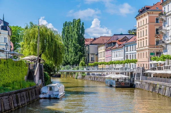 stock image A view down the River Ljubljanica in Ljubljana, Slovenia on a bright morning in summertime