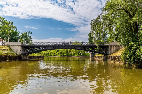 stock image A close up view of the Mortuary Bridge over the Ljubljanica River; the first and only cast iron, hinged bridge in Slovenia in summertime