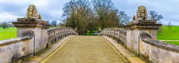 A view over an ornate bridge on the outskirts of Stamford, Lincolnshire, UK in winter