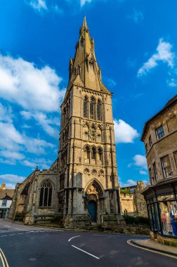 A view towards the front of Saint Marys Church in Stamford, Lincolnshire, UK in springtime clipart