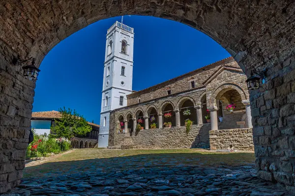 stock image A view through the entrance arch towards the Ardenica Monastery in Albania in the morning in summertime