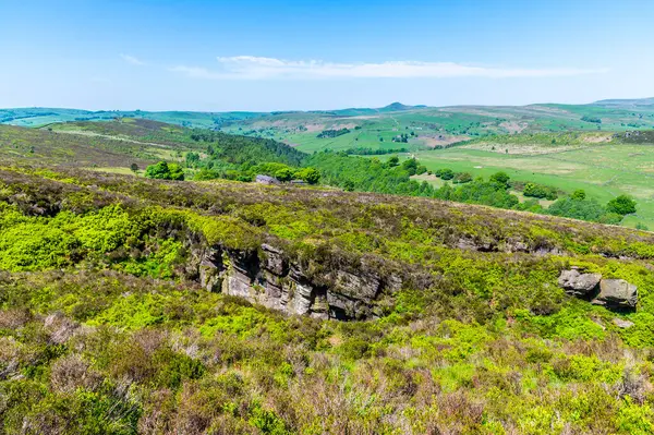 stock image A view across the hillside towards Luds Church near Gradbach, Staffordshire in summertime