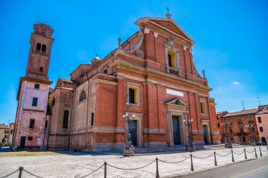 A view towards the cathedral of Saint Cassian the Martyr in Imola, Italy  in summertime clipart