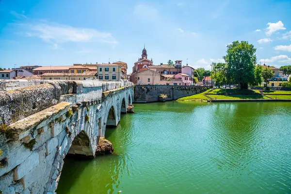 stock image A view south along the west side of the Roman Tiberius Bridge at Rimini, Italy in summertime