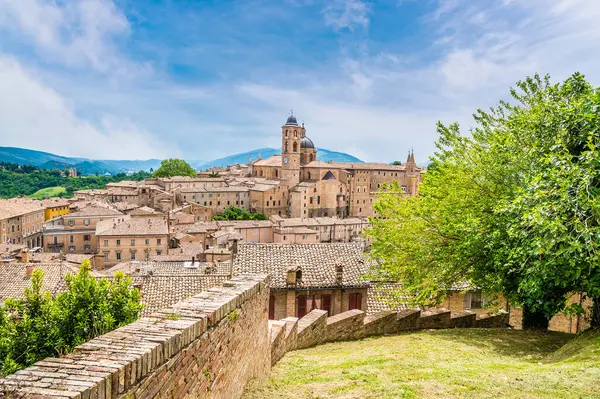 stock image A view along a wall towards the center of the city in Urbino, Italy in summertime