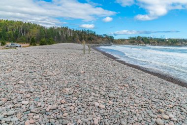 A view along Ingonish beach on the Cabot Trail Nova Scotia, Canada in the fall clipart