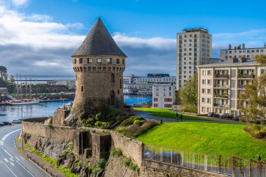 A view down the Penfield river towards the Tanguy tower at Brest, France on a sunny day in autumn clipart