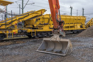 FRANKFURT AM MAIN, GERMANY-FEBRUARY 19, 2023: Track construction wagons in a storage area of the German Federal Railways
